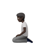knielende persoon: donkere huidskleur
