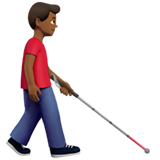 man met taststok: donkergetinte huidskleur, naar rechts gericht