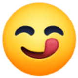 Lachend gezicht dat lippen likt - Facebook