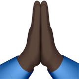 gevouwen handen: donkere huidskleur